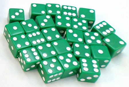 Twenty-five green dice on a table