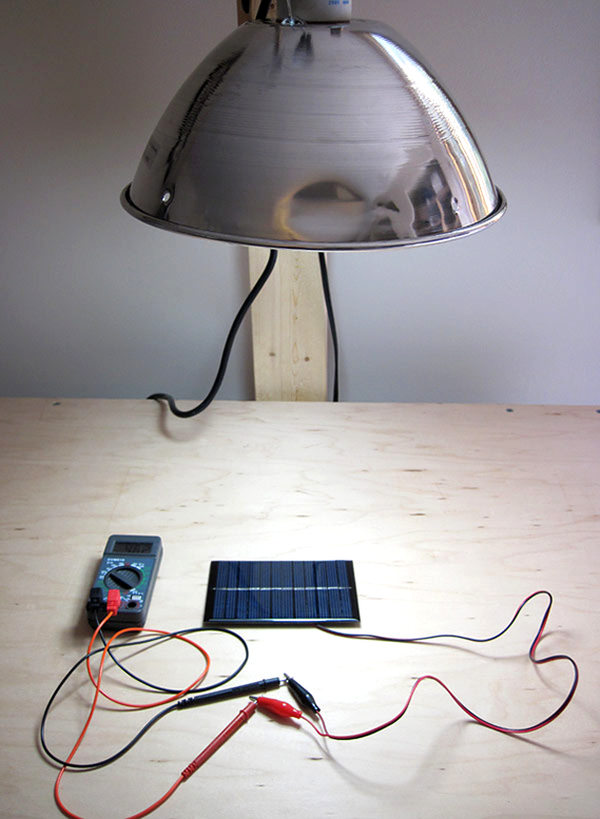 Solar cell setup with overhead light 