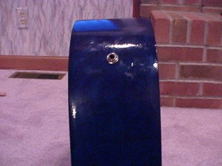 An audio jack installed on a guitar
