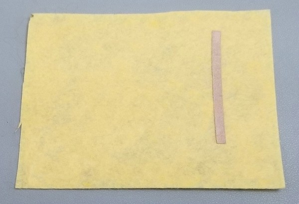Vcc patch with vertical conductive fabric tape rail. 