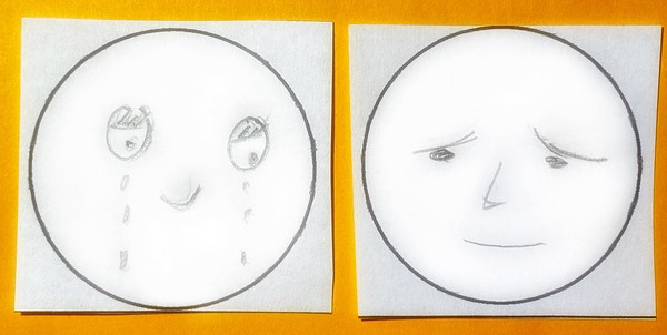 Two sad faces, one without a mouth but tears and a small curved up line to represent the nose, the second with a slightly curved up mouth but eyebrows that are downcast to show the person is sad.