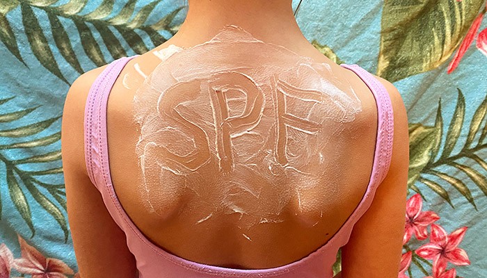 sunscreen on back with SPF