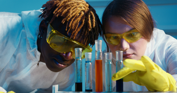 Why Do Science Projects - Teach Perspective - Two students working with test tubes