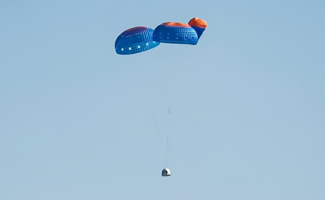 Blue Origin NS-25 descending with only two of three parachutes fully deployed