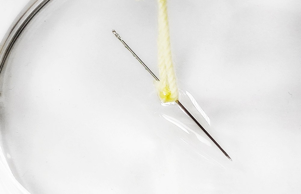 needle on top of water surface tension thumbnail