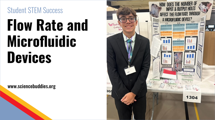 Student with microfluidic device project display board at the NMSEF in PA