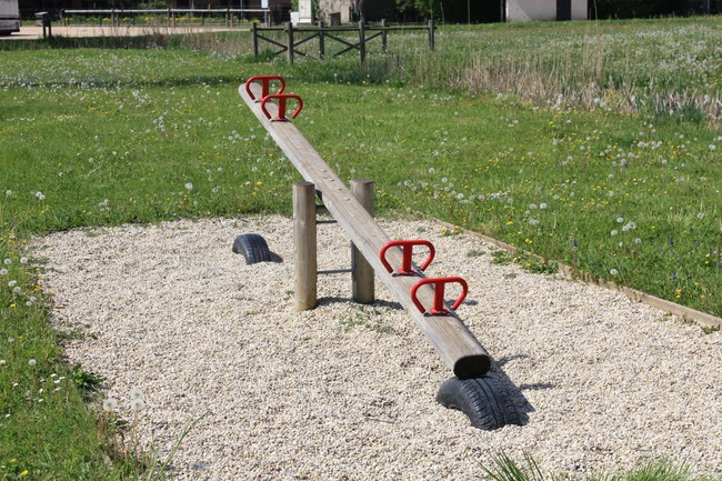 wooden see-saw at a playground