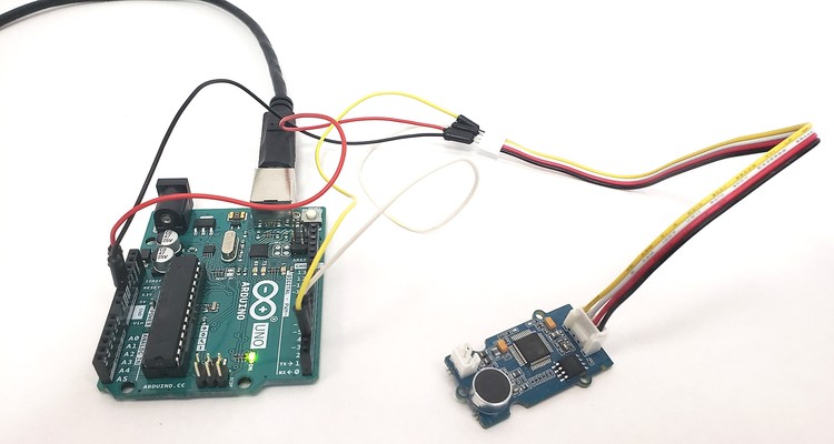 Grove speech recognizer board connected to the Arduino with a ribbon cable and jumper wires