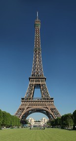 the Eiffel tower, a tall tower made from trusses that is wider at the base than at the top