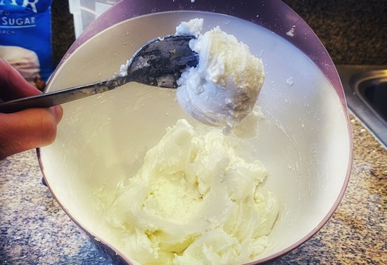 A ball the size of a ping pong ball of icing that sticks to a spoon held sideways.   