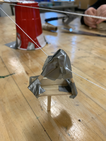 Students working on ski lift engineering designs and simple machines in 6th grade
