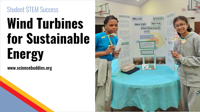 Students with Wind Turbine project and display board at the school's STEM fair