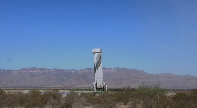 Blue Origin's New Shepard NS-25 booster stage after landing in the desert