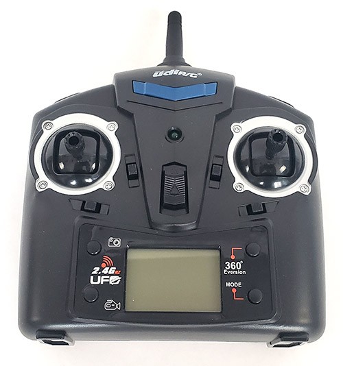 A handheld drone controller with two joysticks.