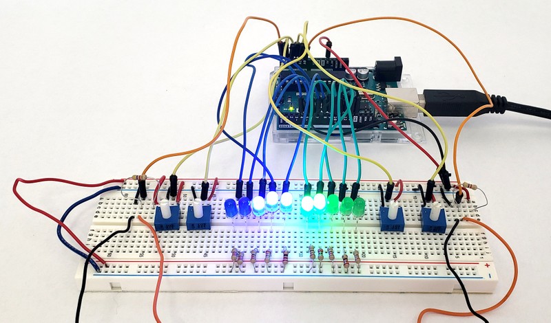 A close-up photo of the Arduino and circuit on a breadboard. 