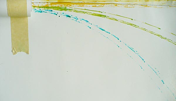 Lines of differing curvatures are drawn using rolling marbles